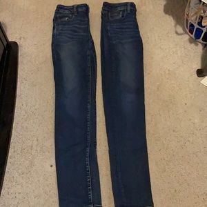 2 pairs of blue jeans